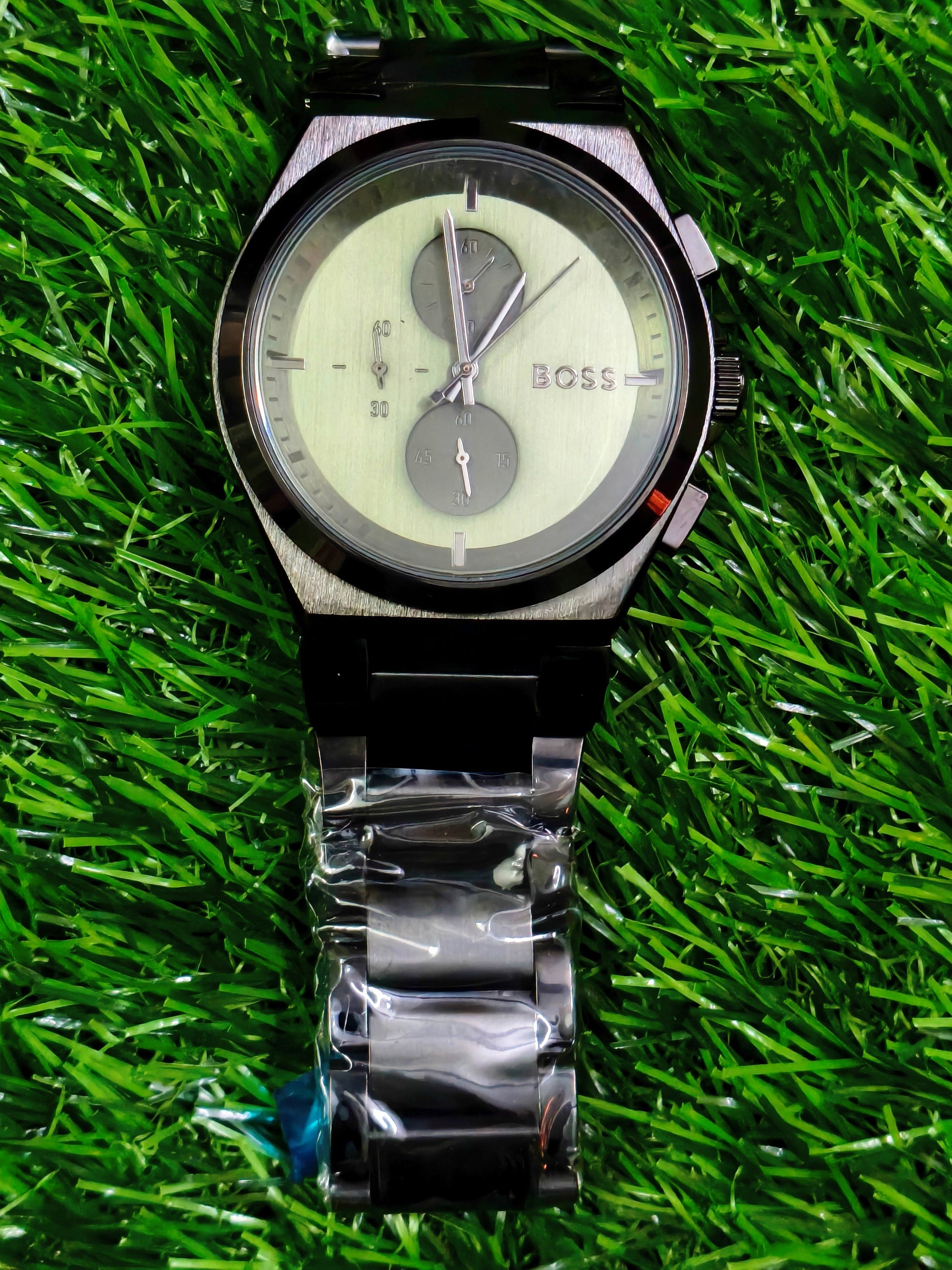 Hugo Boss chronograph watch with cream dial, gunmetal case and black stainless steel bracelet